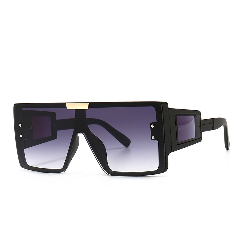 Large frame sunglasses with widened legs and patch sunglasses